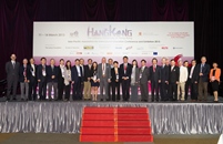 The officiating guests of the opening ceremony of the APAIE Conference and Exhibition 2013 take a group photo with members of APAIE Board of Directors, guests, representatives of supporting organizations, and CUHK officers.